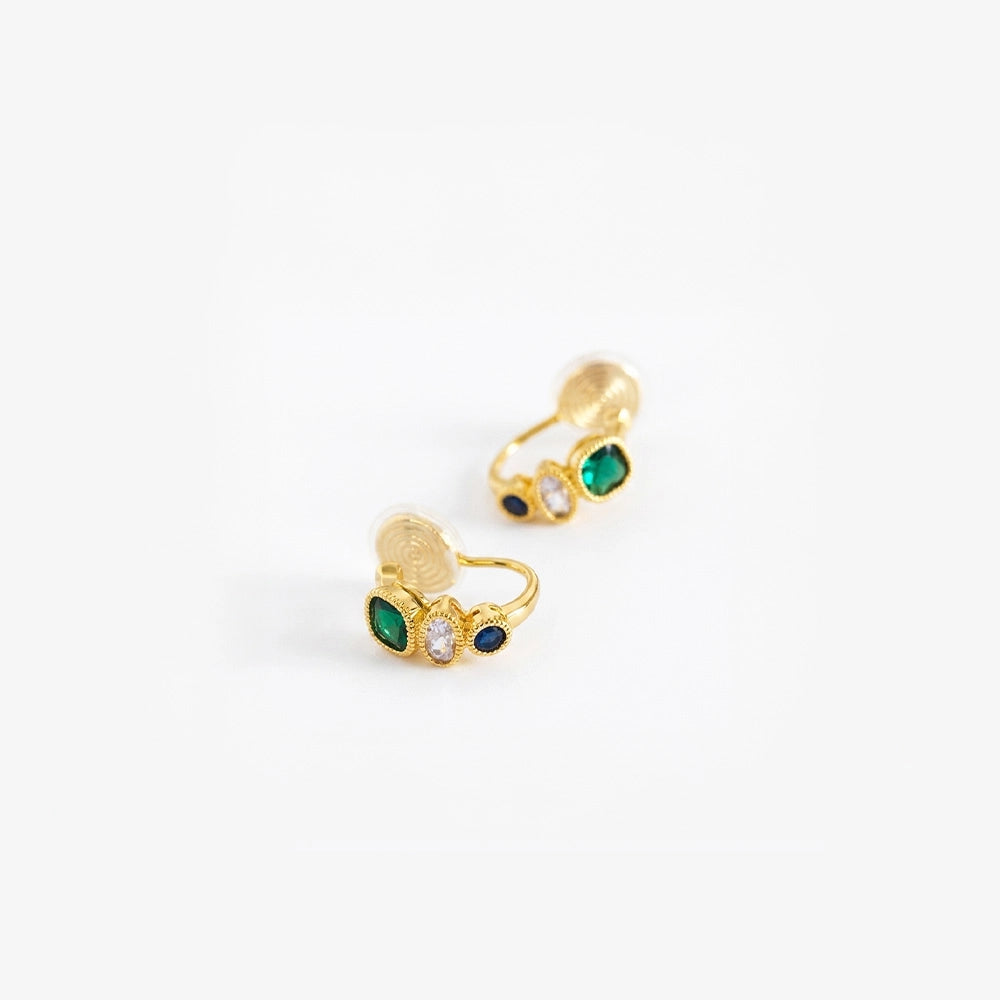 Gold triple color rhinestone emerald clip-on earrings with green, white and blue stones, shown from front and side view 