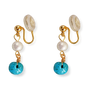 A pair of gold-tone clip-on dangle earrings featuring a white pearl bead, a round turquoise blue stone disc, and a textured clear resin back, shown on a plain white background.
