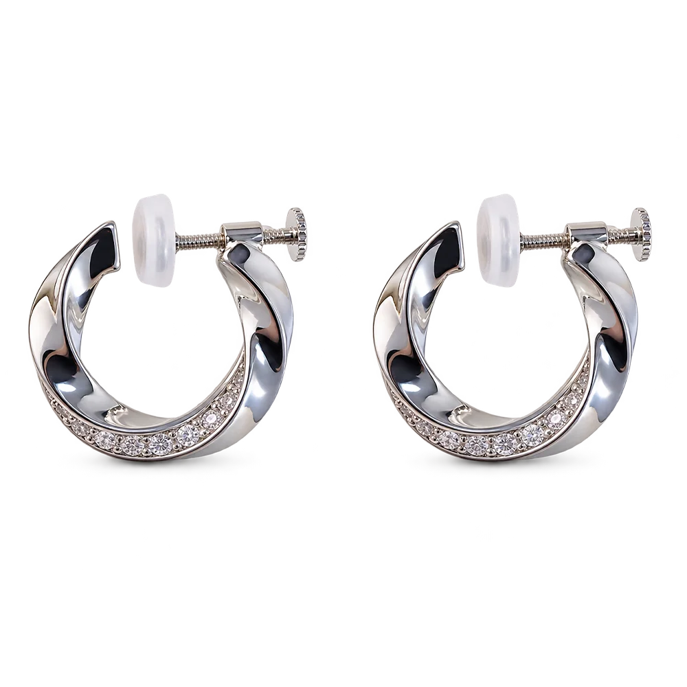 A pair of silver-toned hoop earrings with a twisted design, featuring a row of small clear crystals along the lower curve and white post backings, shown on a plain white background.