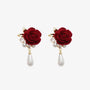 Velvet Rose & Pearl Drop Clip-On Earrings with gold-plated leaves, zircons, and faux pearls.