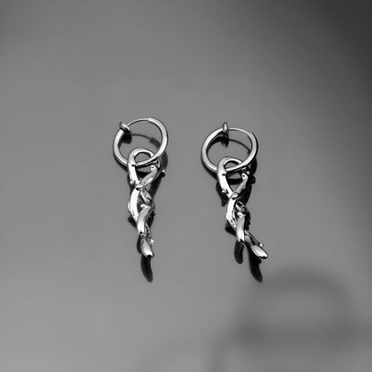 Close-up of Thorn Vine Clip-On Hoop Earrings showcasing unique design and craftsmanship.