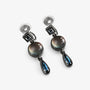 Vintage multi-gem drop clip-on earrings with smoky gray and blue stones in gunmetal finish