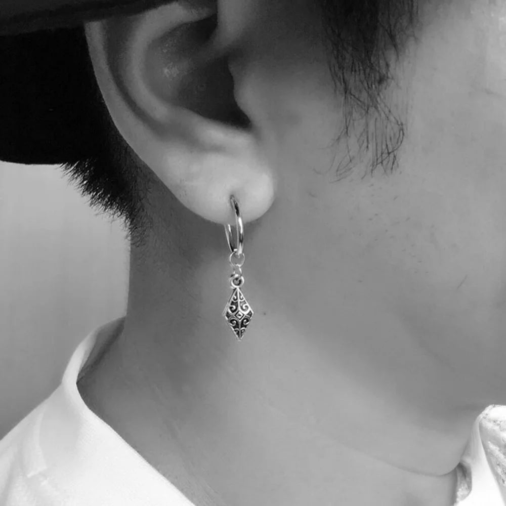 Vintage tribal drop clip-on earrings silver side view worn on ear filigree detail