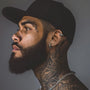 Silver tyre clip-on earrings side profile view on male model wearing black cowboy hat