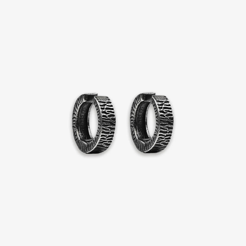 Vintage Tyre Clip-On Earrings textured silver pair front view on white background