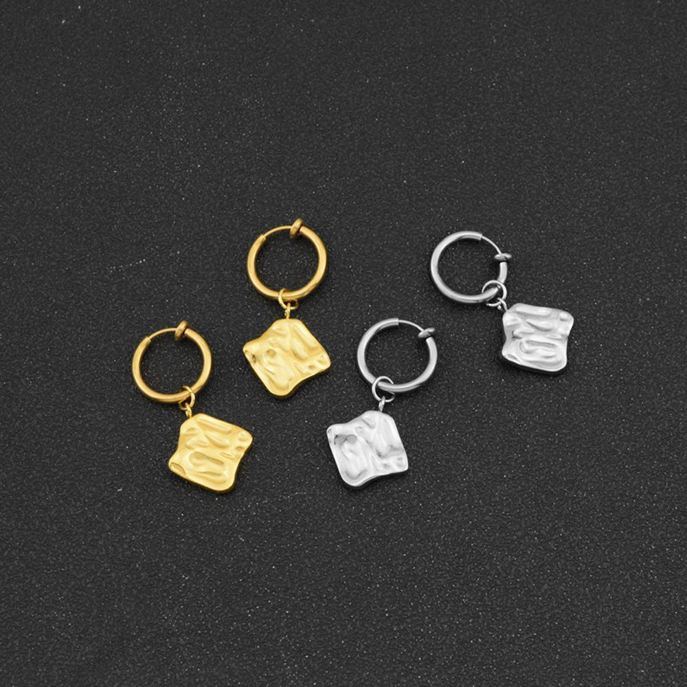 Experience timeless elegance with our Luxurious Square Clip-On Earring, featuring a unique wave pattern on a square charm.