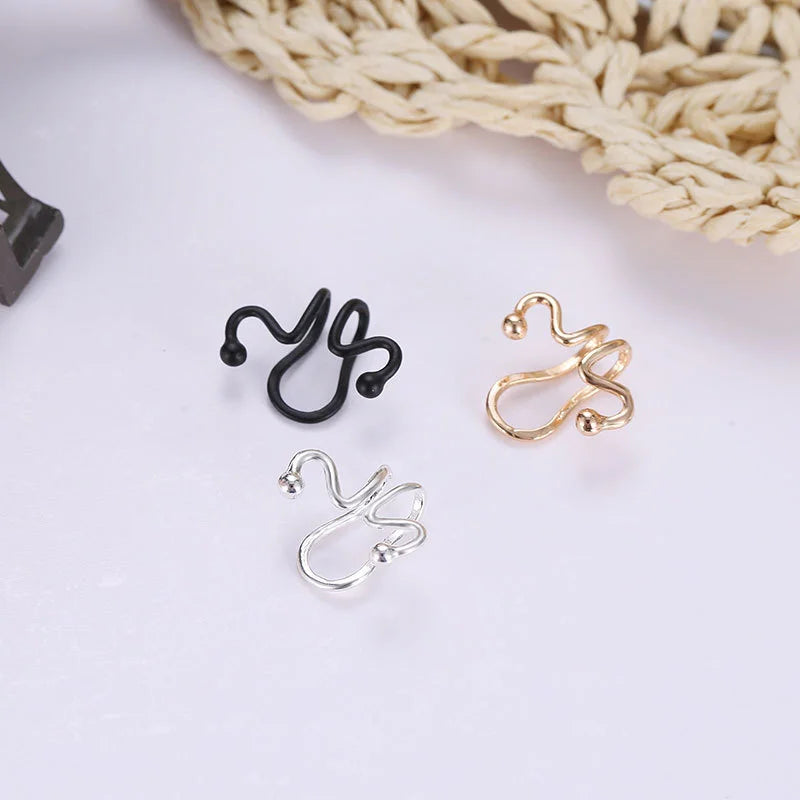 Wavy Tragus Cuff in Gold alongside its silver and black counterparts, emphasizing choice.