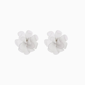 White flower clip on earrings front view on white background