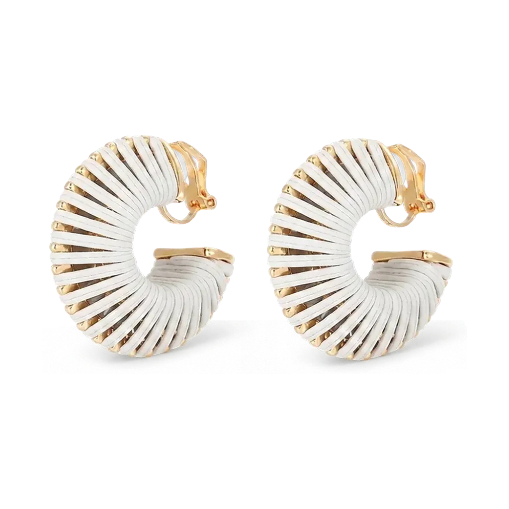 Pair of white leather wrapped clip-on hoop earrings on fabric