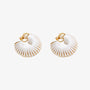 Pair of white leather wrapped clip-on hoop earrings on fabric