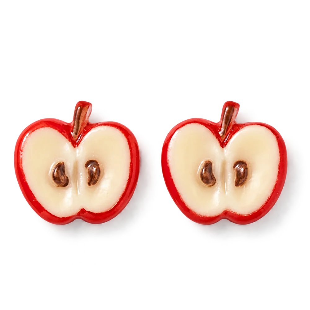 A pair of red and cream apple-shaped stud earrings with brown seeds, shown on a clean white background.