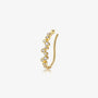 The Aura gold lobe cuff featuring a sparkling zircon cluster, shown on a clean white background to highlight its clip-on design.