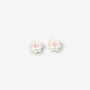 A pair of small flower-shaped stud earrings with iridescent white petals and soft pink centers, shown on a plain light gray background.