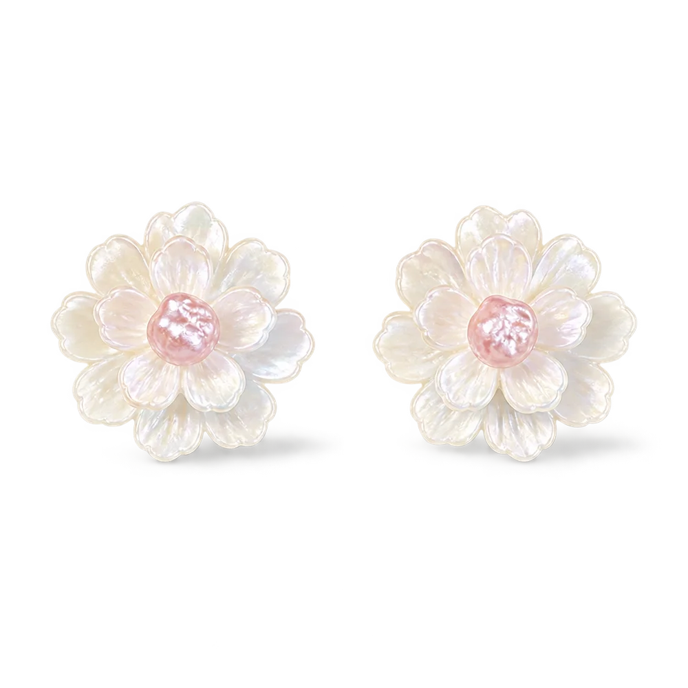 A pair of flower-shaped stud magnetic earrings made from iridescent white mother-of-pearl petals with a soft pink center, shown on a clean white background.