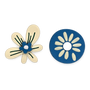 A pair of floral clip on earrings a white background. One is featuring a cream-colored five-petal flower with a blue center, white dot, and green leaf-like lines.