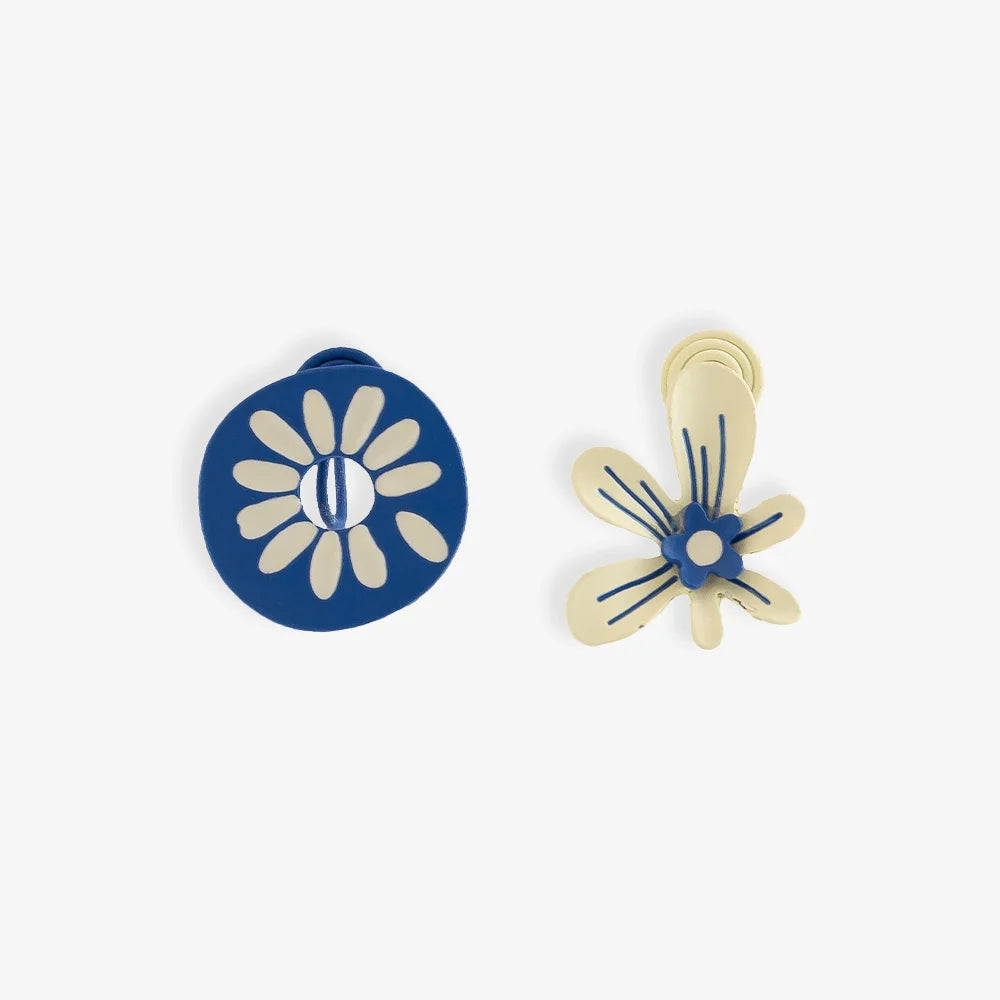 Blue Flower Mismatched Clip-On Earrings front view on white background showing navy and cream floral design