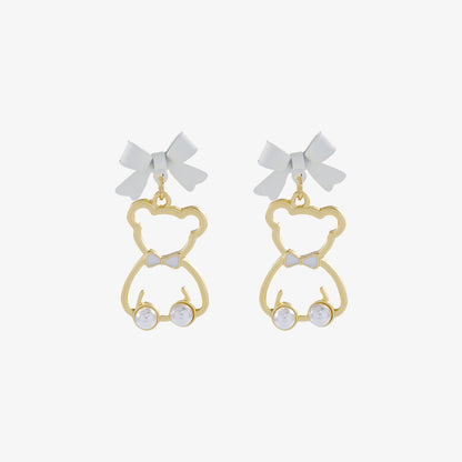 Dress up her ears with our "Bow-Tied Bear Pearl Clip-On Earrings." Featuring gold-finished bears with pretty pearl details and sweet bows, these clip-ons are perfect for young princesses.