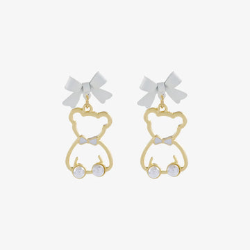 Gold bow-tied bear pearl clip-on earrings front view with white bows and pearl details on white background