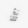 Side and front views of brushed silver-tone rectangle pearl clip-on studs