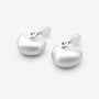 Pair of satin-brushed dome clip-on earrings with adjustable hinged clips and clear pads