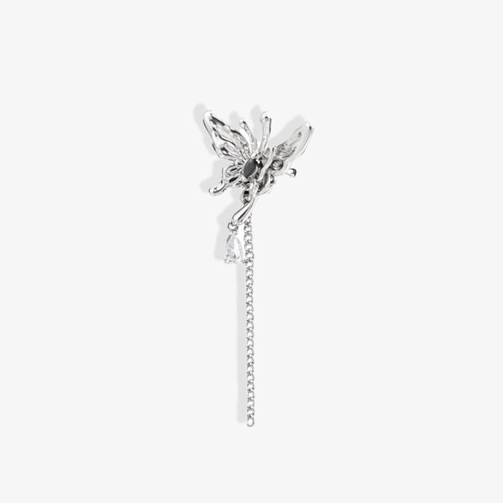 Close-up of the Butterfly and Crystal Cascade Ear Cuff showcasing intricate butterfly design with black and white zircon stones and delicate chain details.