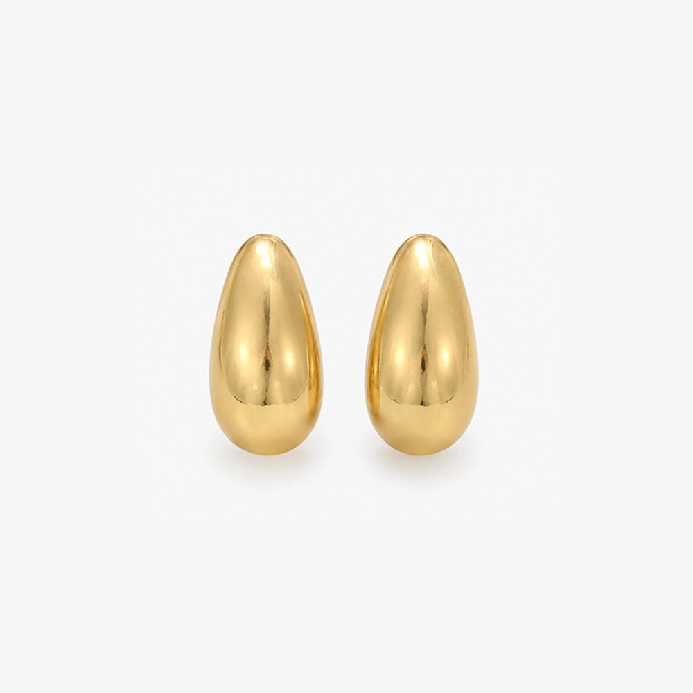 Chunky Drop Clip-On Earrings in Gold — pair of teardrop earrings on plain background