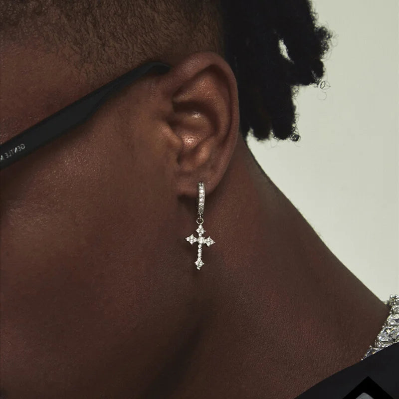 White gold zirconia cross dangle clip-on earrings side view worn on ear close-up