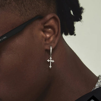 Model wearing Zirconia Cross Clip On Earrings.