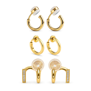 Set of 3 pairs of gold clip-on hoop earrings on a white background.
