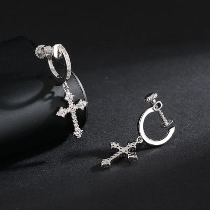 Close up of Zirconia Cross Clip On Earrings highlighting the cross design.