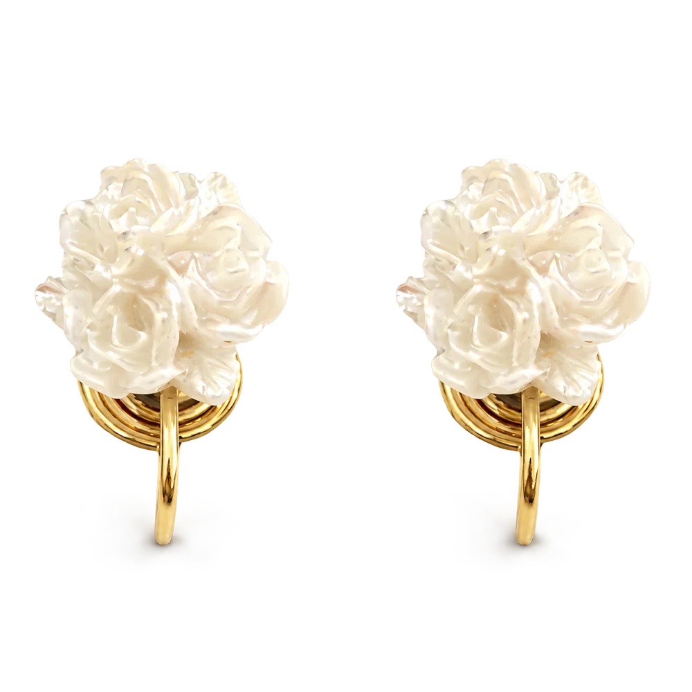 A pair of dainty white flower clip-on earrings with gold-tone mosquito coil backs, shown isolated on a white background.