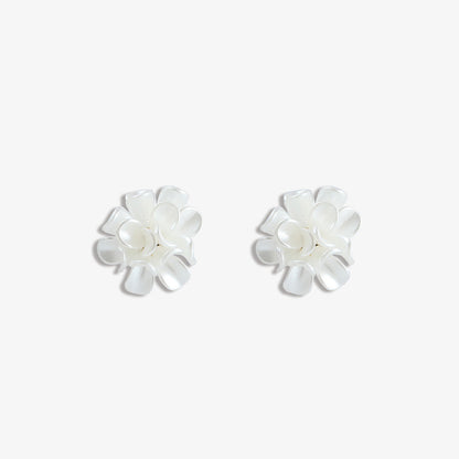  These White Flower Clip-On Stud Earrings are a modern take on a classic design, perfect for spring weddings and garden parties. Made of durable resin and alloy, their hinge-back closure ensures comfort without compromising style. The pristine white color adds a fresh touch to any ensemble, making them a charming accessory for any celebratory occasion.