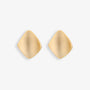 Chunky gold square clip-on stud earrings make a statement with their geometric design. Crafted from alloy with a secure coil clip closure, these non piercing ear studs are perfect for those who love to add a touch of drama to their look. 