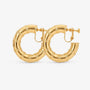 A pair of gold bamboo hoop clip-on screw back earrings on a white background