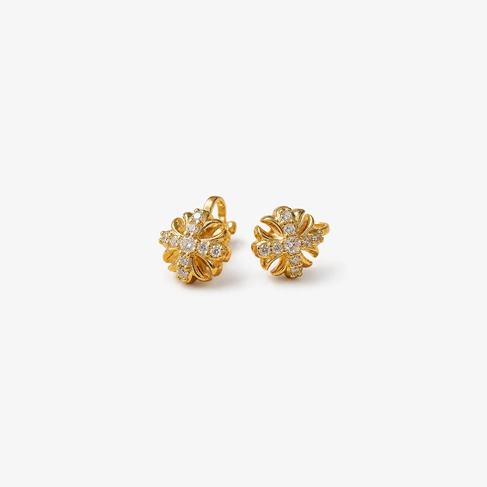 Gold Cross Clip-On Stud Earrings shown at angle highlighting clip-on closure and crystal detail