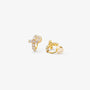 Angled view of the cushioned clip on closure on a gold cross huggie earring