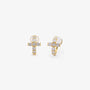 Gold cubic zirconia cross clip on huggie earrings shown as a pair from the front