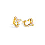 A pair of gold huggie hoop earrings adorned with clear cubic zirconia stones, displayed on a clean white background.