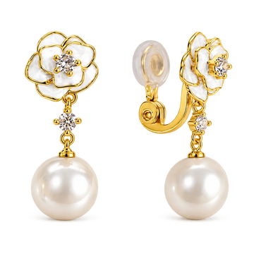 A pair of gold and pearl flower-shaped drop earrings with clear gemstone centers, shown on a clean white background. One earring is facing forward to show the flower and dangling pearl, while the other is angled to show the clip-back closure.