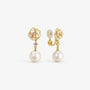 Pair of gold flower and shell pearl drop clip on earrings with white enamel petals