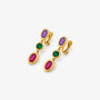 Close up detail of bezel set cubic zirconia on gold clip on drop earrings