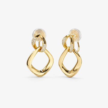 Pair of gold geometric pave drop earrings on a white background
