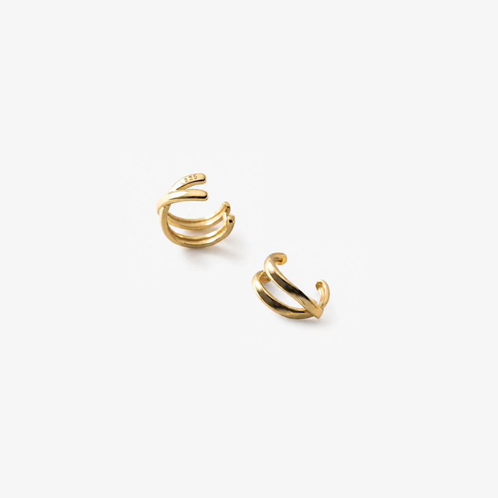 Gold Helix Cross Ear Cuffs in gold displayed on white background