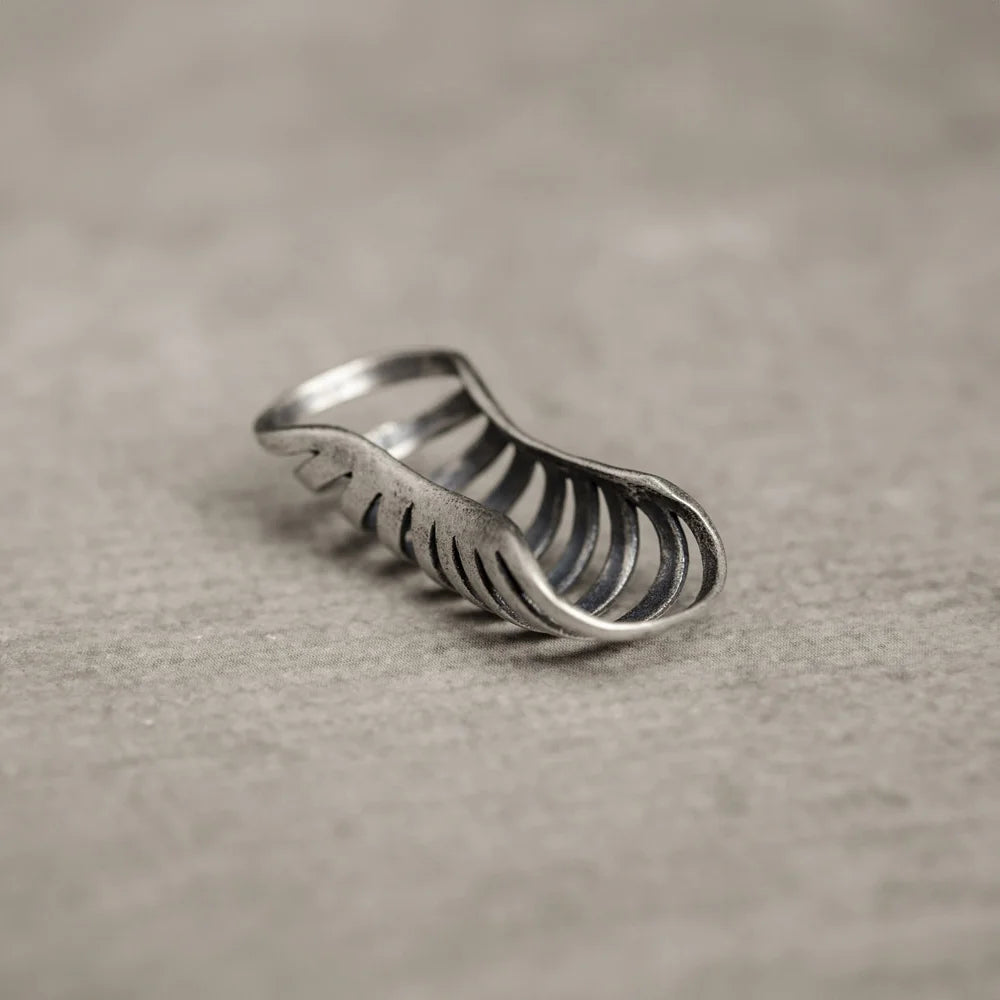 Silver Gothic Helix Ear Cuff angled side view on gray background showing detailed metalwork