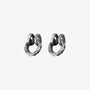 A single hammered oxidized silver clip-on ear cuff with a rustic, textured finish, shown isolated on a white background.