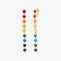Gold clip-on earrings featuring a cascade of heart-shaped charms in rainbow colors. These pride earrings celebrate love and lesbian identity. Perfect lgbt gift.