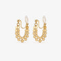 A pair of gold honeycomb mesh clip-on hoop earrings in a U-shape design, shown on a clean white background.