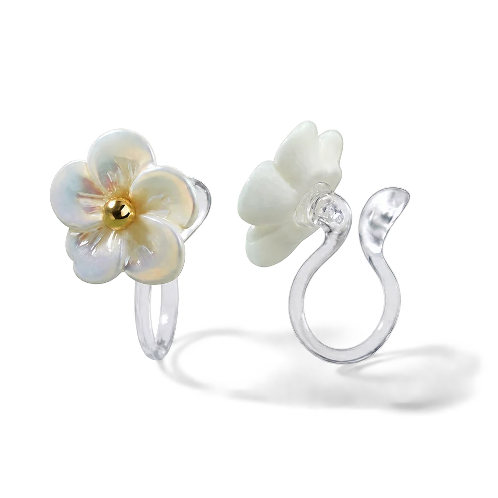 Close-up detail of a resin flower earring for non-pierced ears showing the transparent invisible clip-on back and pearlescent finish.