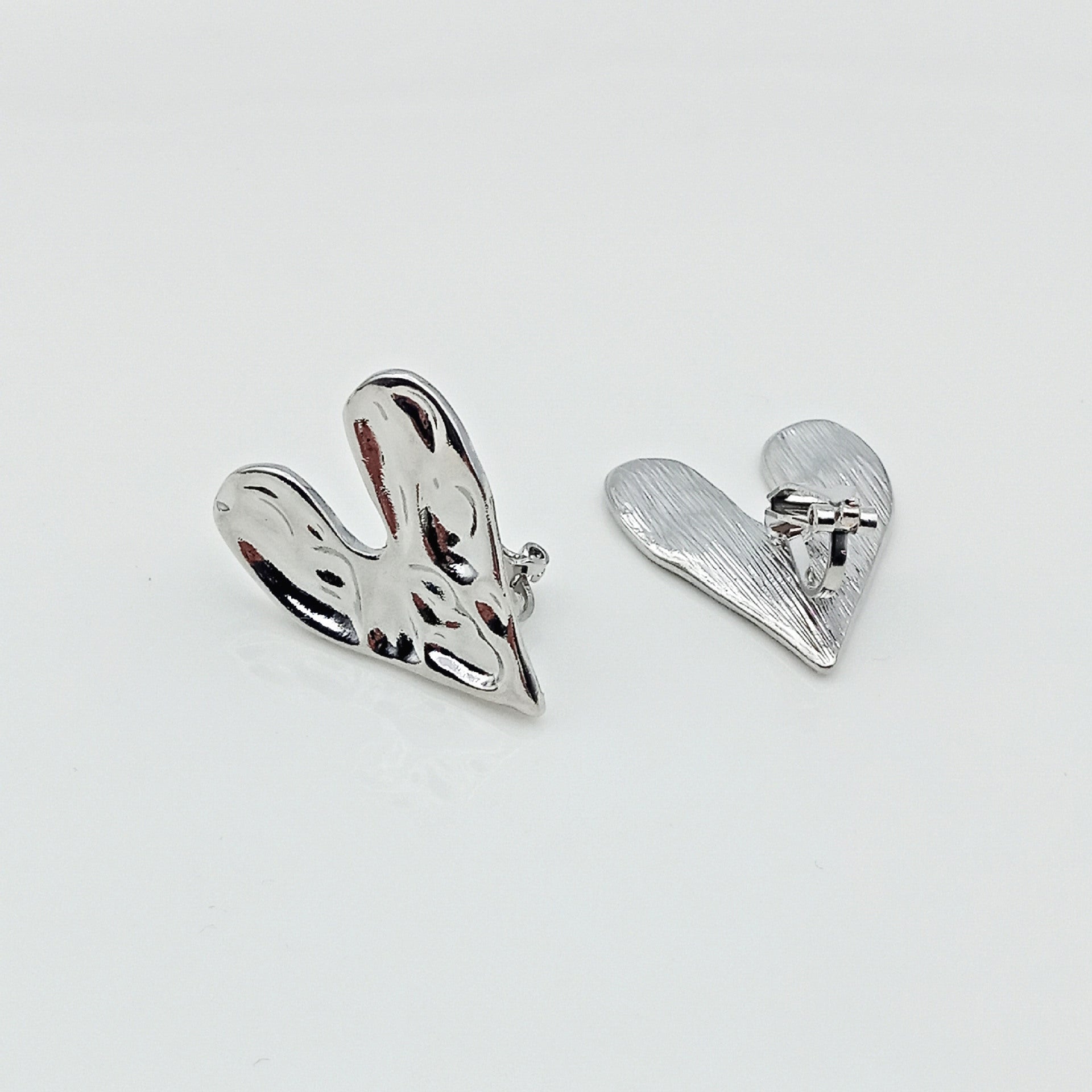 silver heart clip on earrings hinge back clip on