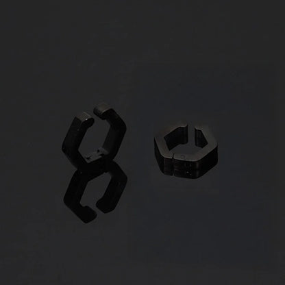 A stylish product shot of the men's titanium steel clip-on huggie earrings on a reflective black surface.